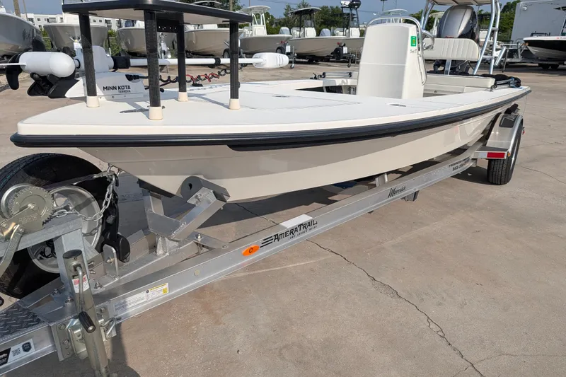 Slide: The Image of 2021 Maverick 18 HPX-V boat on trailer, featuring Minn Kota trolling motor. - 4