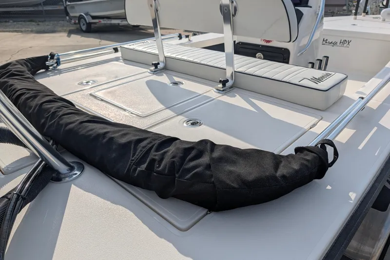 Slide: The Image of 2021 Maverick 18 HPX-V boat deck with seating and storage compartments. - 21