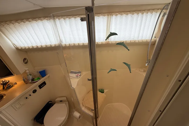 Slide: The Image of Bathroom interior of 1999 Carver 380 Santego yacht with shower and toilet. - 43