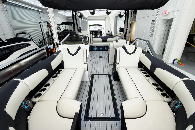 Slide: The Image of Luxurious interior of 2025 Montara Surf Boss 2.0 SL 25' boat with plush seating. - 5