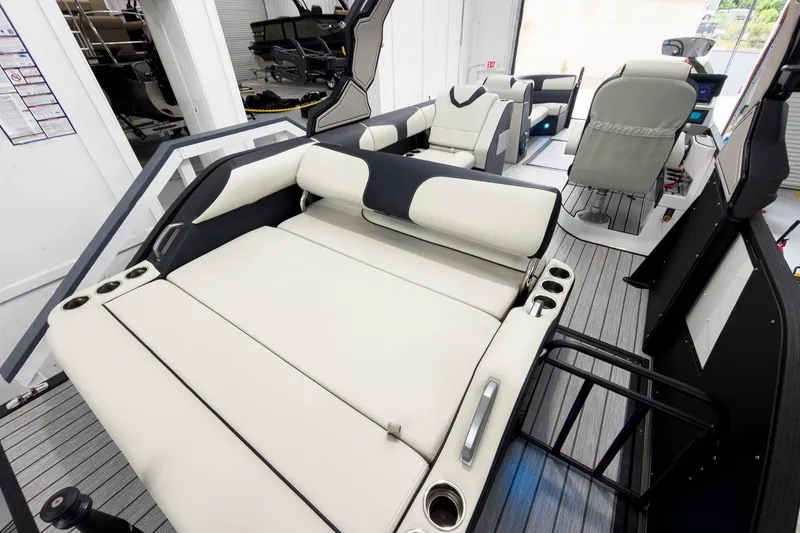 Slide: The Image of Luxurious interior of 2025 Montara Surf Boss 2.0 - SL 25' boat with plush seating. - 18