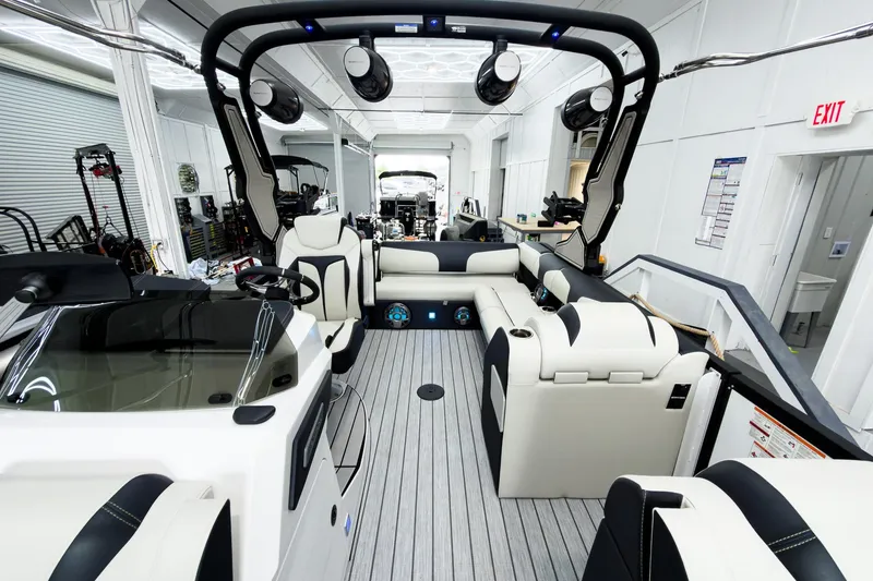 Slide: The Image of Luxurious interior of 2025 Montara Surf Boss 2.0 - SL 25' boat, featuring sleek seating and modern design. - 9