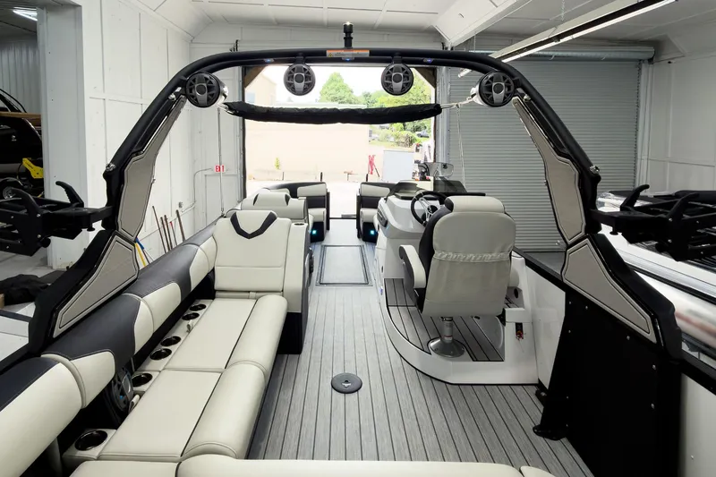 Slide: The Image of 2025 Montara Surf Boss 2.0 - SL 25' boat interior with luxurious seating and modern design. - 16