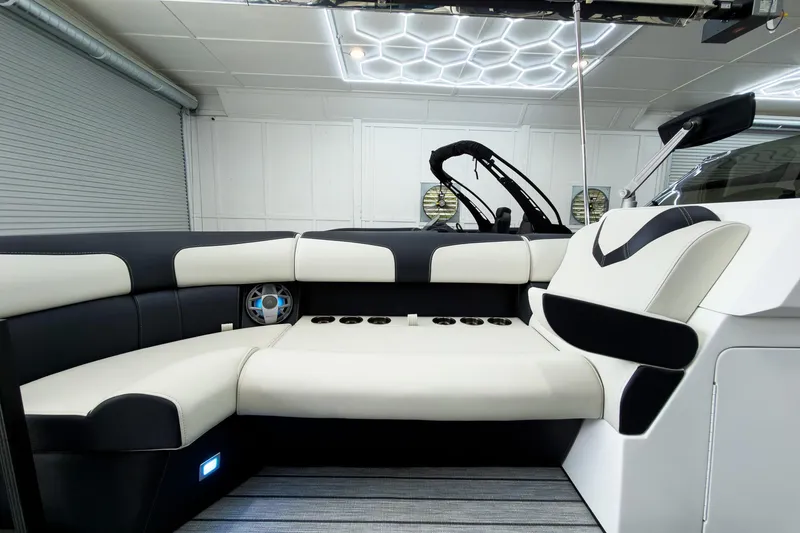 Slide: The Image of Luxurious interior of 2025 Montara Surf Boss 2.0 - SL 25' boat with plush seating. - 7