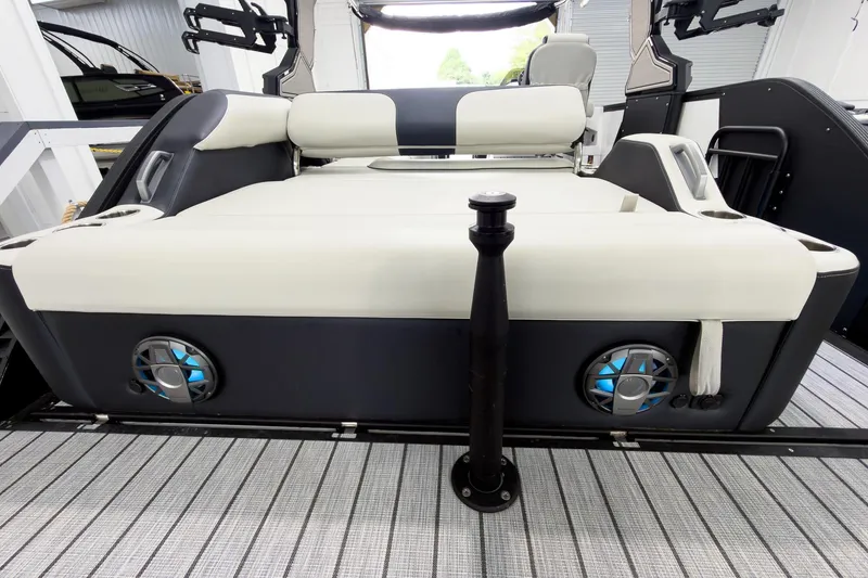 Slide: The Image of 2025 Montara Surf Boss 2.0 - SL 25' boat interior with cushioned seating and speakers. - 20