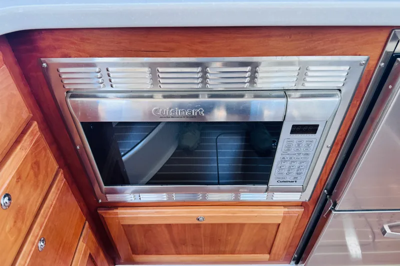Slide: The Image of Built-in Cuisinart microwave in 2018 Back Cove 37 yacht kitchen. - 23