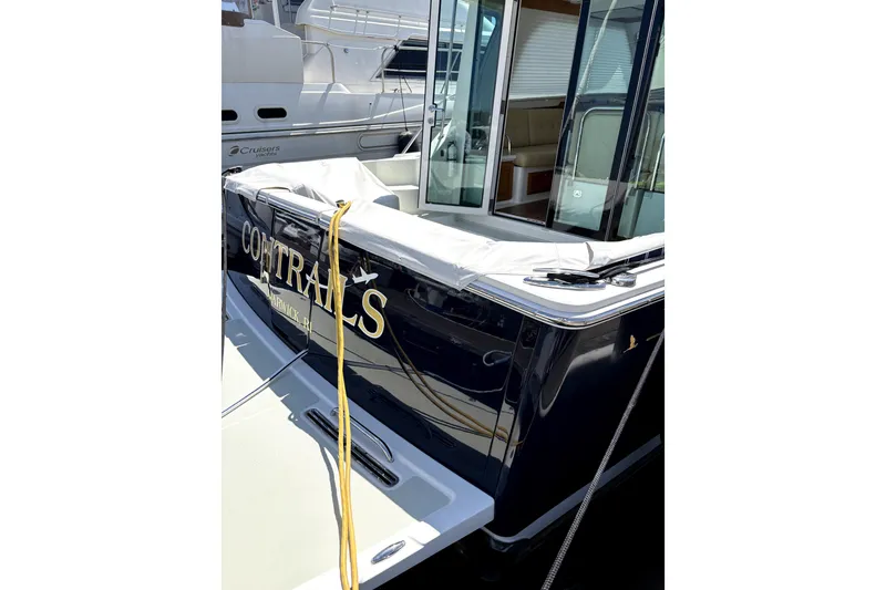 Slide: The Image of 2018 Back Cove 37 yacht docked, featuring sleek design and spacious interior. - 4
