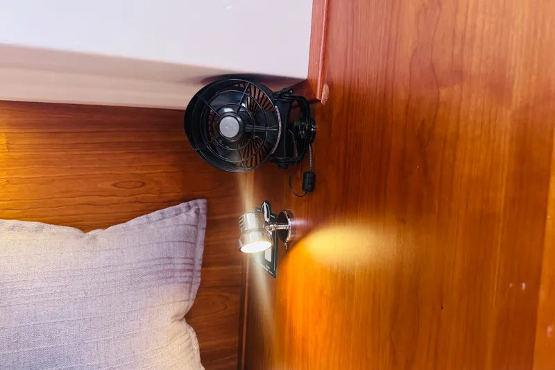 Slide: The Image of Cozy cabin interior of 2018 Back Cove 37 with fan and reading light. - 16