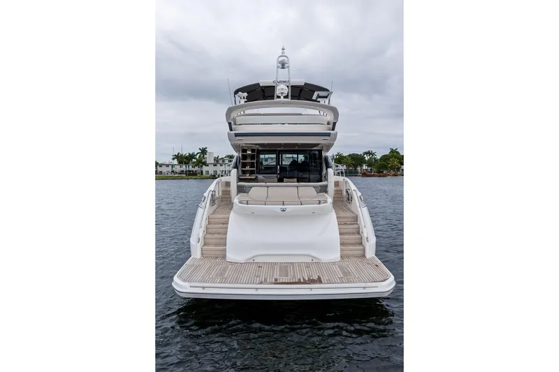 Slide: The Image of Luxury 2020 Princess S62 yacht on water, showcasing elegant design and spacious deck. - 1