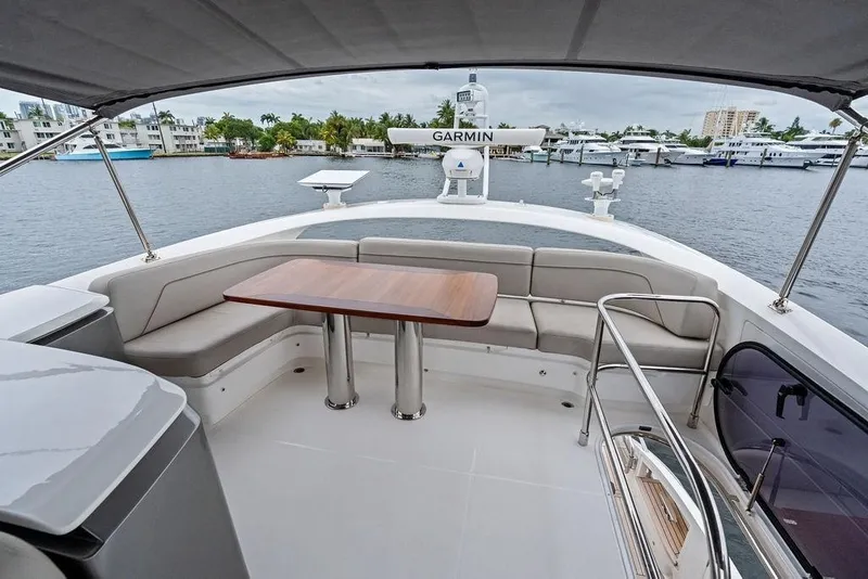 Slide: The Image of Luxurious 2020 Princess S62 yacht with elegant seating and table on deck. - 18