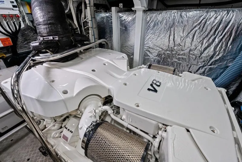 Slide: The Image of Engine room of a 2020 Princess S62 yacht featuring a V8 engine. - 73