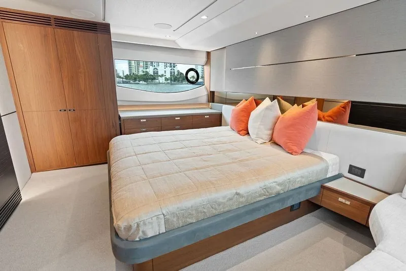 Slide: The Image of Luxurious bedroom interior of 2020 Princess S62 yacht with modern design and plush bedding. - 63