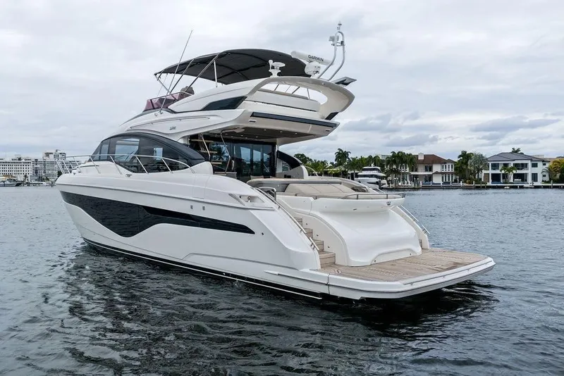 The Image of Luxurious 2020 Princess S62 yacht on serene water, showcasing sleek design and elegance. - 0