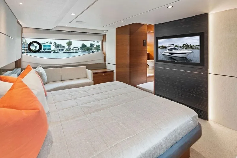 Slide: The Image of Luxurious 2020 Princess S62 yacht bedroom with modern decor and waterfront view. - 62
