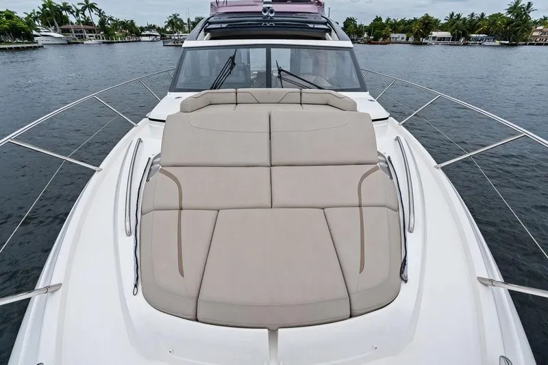 Slide: The Image of 2020 Princess S62 yacht with spacious deck and luxurious seating on the water. - 14