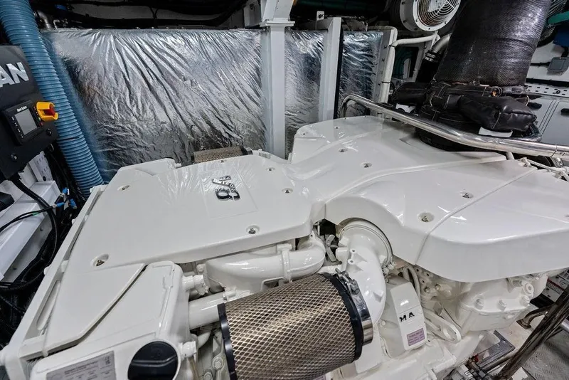 Slide: The Image of Engine room of a 2020 Princess S62 yacht, showcasing a clean, modern design. - 74