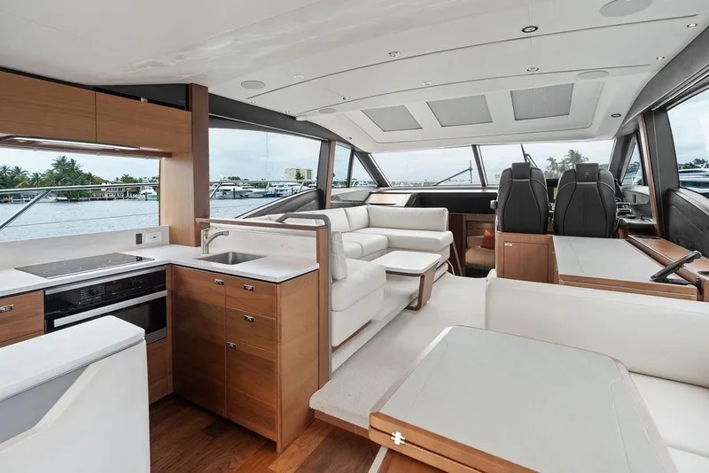 Slide: The Image of Luxurious interior of 2020 Princess S62 yacht with modern kitchen and seating area. - 37
