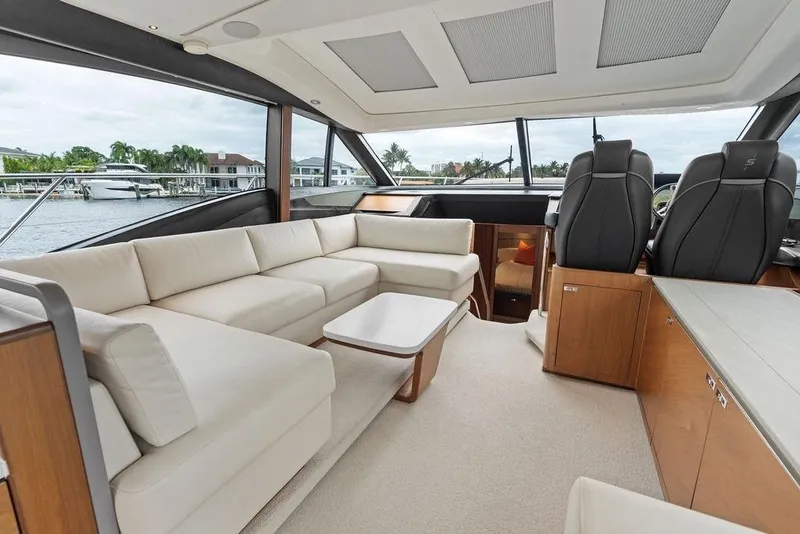 Slide: The Image of Luxurious interior of 2020 Princess S62 yacht with elegant seating and panoramic windows. - 42
