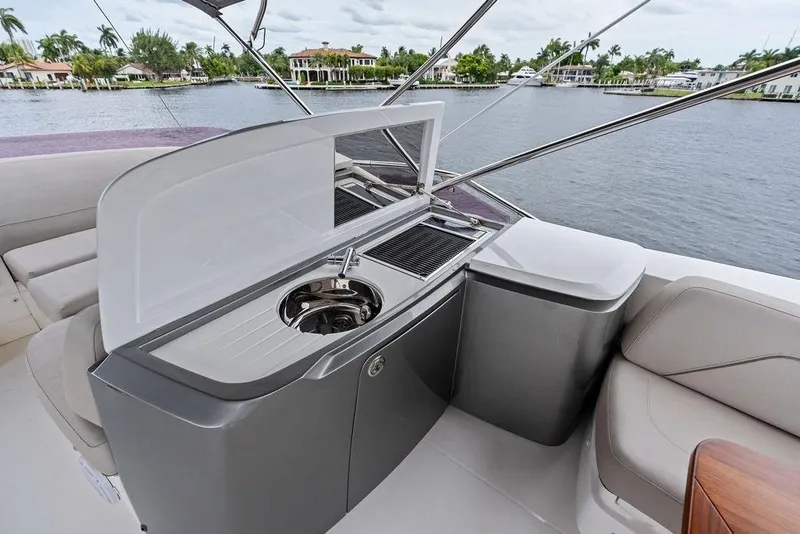 Slide: The Image of Luxurious 2020 Princess S62 yacht deck with sleek outdoor kitchen and waterfront view. - 19