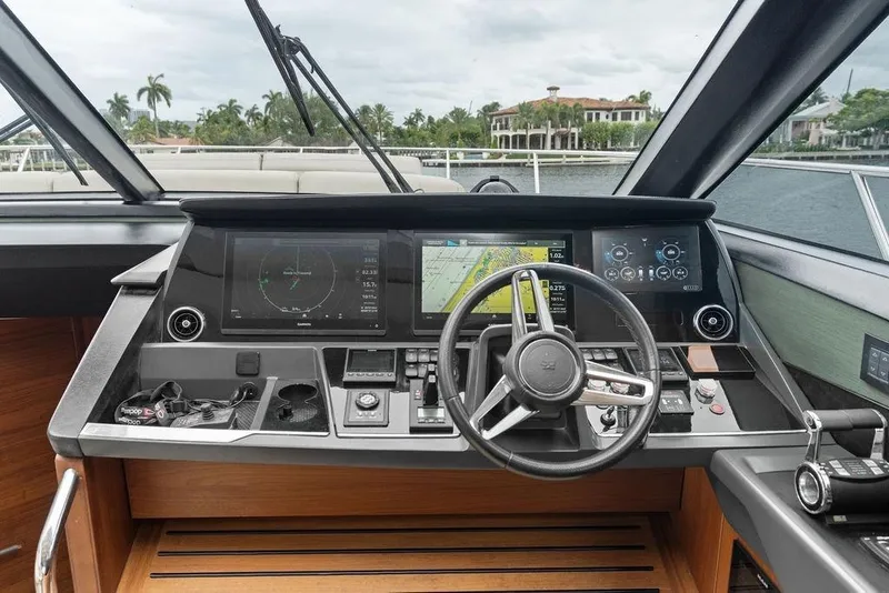 Slide: The Image of Cockpit of 2020 Princess S62 yacht with advanced navigation systems and luxurious design. - 47
