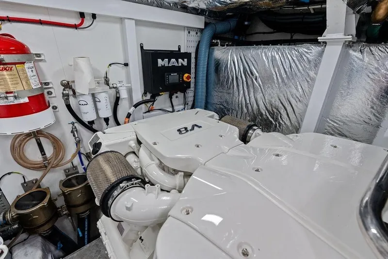 Slide: The Image of Engine room of a 2020 Princess S62 yacht featuring a MAN V8 engine. - 75