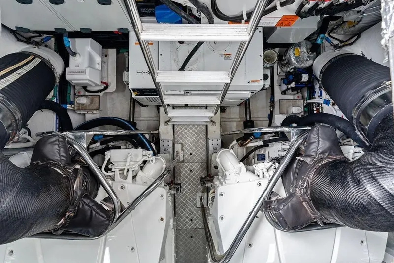 Slide: The Image of Engine room of 2020 Princess S62 yacht, showcasing dual engines and mechanical components. - 81