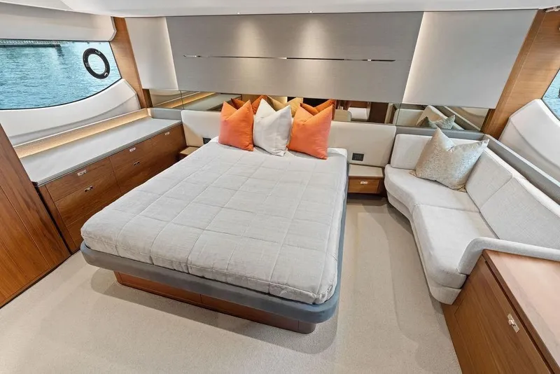 Slide: The Image of Luxurious 2020 Princess S62 yacht bedroom with elegant decor and waterfront view. - 61