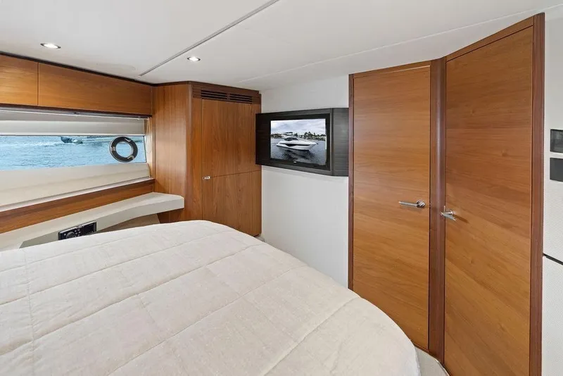 Slide: The Image of Luxurious cabin interior of 2020 Princess S62 yacht with wood finishes and modern amenities. - 55