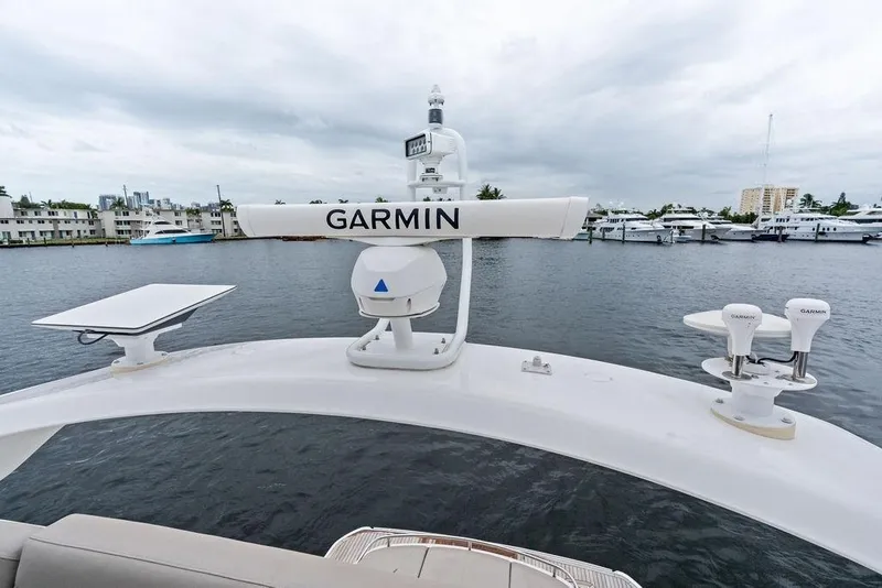 Slide: The Image of 2020 Princess S62 yacht with Garmin navigation equipment, docked in a marina. - 68