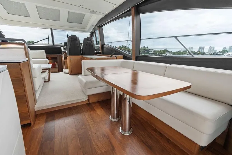 Slide: The Image of Luxurious interior of 2020 Princess S62 yacht with elegant seating and wooden table. - 36