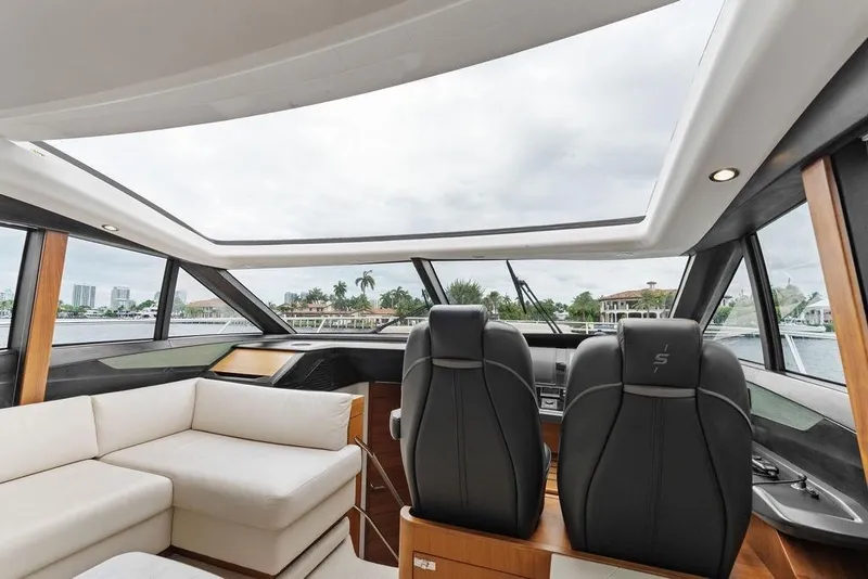 Slide: The Image of Luxurious interior of 2020 Princess S62 yacht with panoramic windows and plush seating. - 43