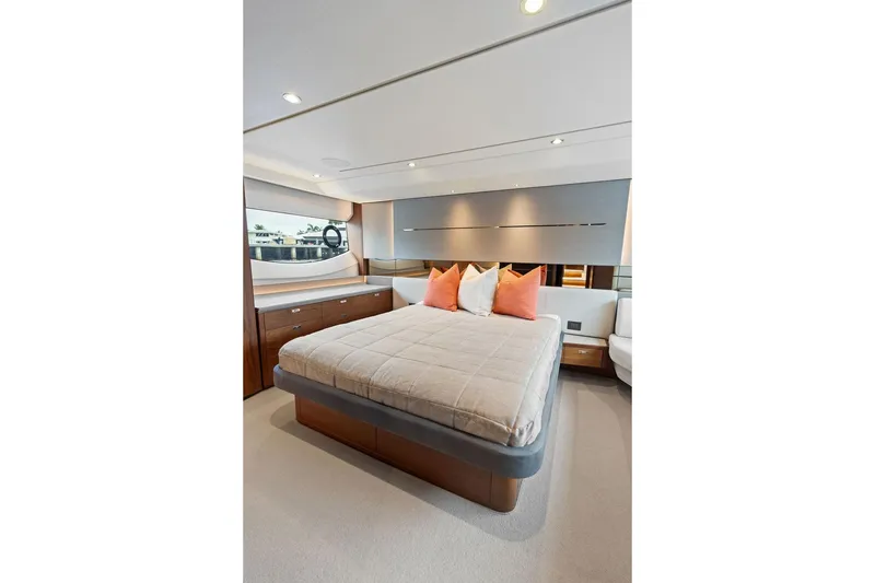 Slide: The Image of Luxurious bedroom interior of 2020 Princess S62 yacht with modern design and plush bedding. - 66
