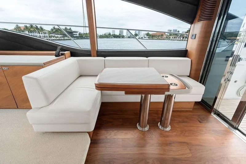 Slide: The Image of Luxurious interior of 2020 Princess S62 yacht with elegant seating and wooden table. - 35