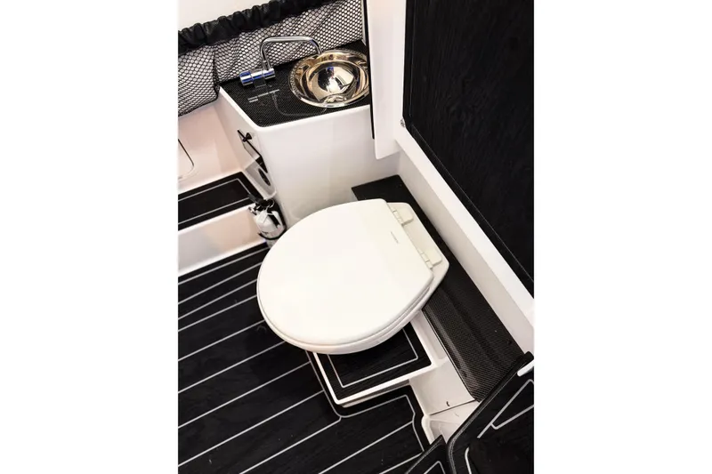 Slide: The Image of Luxury bathroom interior of 2026 Nor-Tech 390 Sport boat with modern amenities. - 13