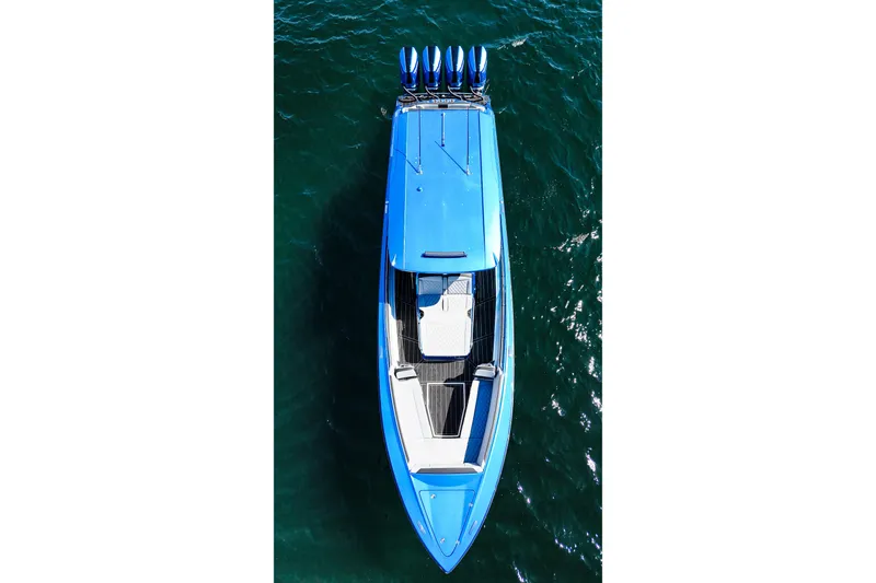Slide: The Image of Aerial view of 2026 Nor-Tech 390 Sport boat on blue water. - 9