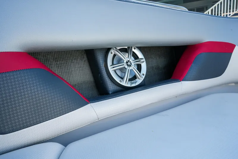 Slide: The Image of Speaker system on 2018 Four Winns HD240 OB boat with red and gray upholstery. - 25