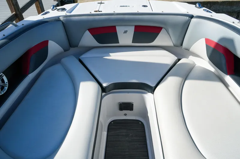 Slide: The Image of 2018 Four Winns HD240 OB boat interior with cushioned seating and modern design. - 23