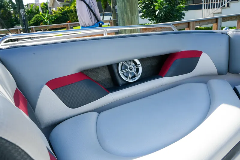 Slide: The Image of Interior seating of 2018 Four Winns HD240 OB boat with speaker detail. - 24