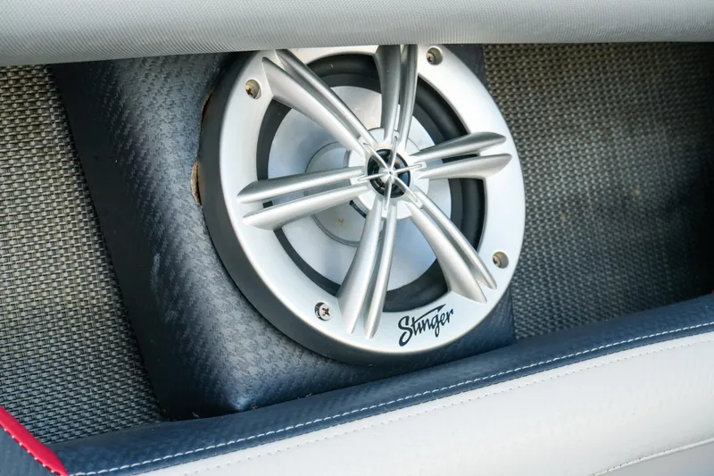 Slide: The Image of Close-up of a Stinger speaker in a 2018 Four Winns HD240 OB boat. - 26