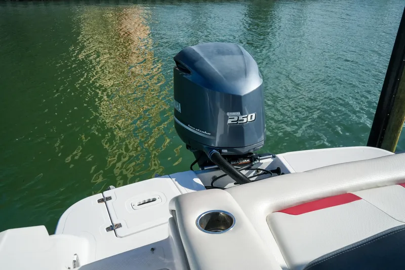 Slide: The Image of 2018 Four Winns HD240 OB boat with Yamaha 250 outboard motor on calm water. - 47
