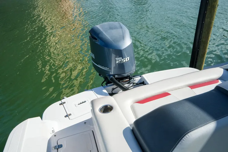 Slide: The Image of 2018 Four Winns HD240 OB boat with Yamaha 250 outboard motor on water. - 39