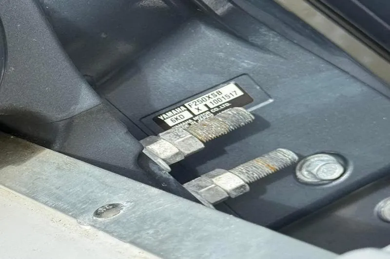 Slide: The Image of Close-up of Yamaha F250XSB engine components on a 2022 Sea Hunt Ultra 234 boat. - 29