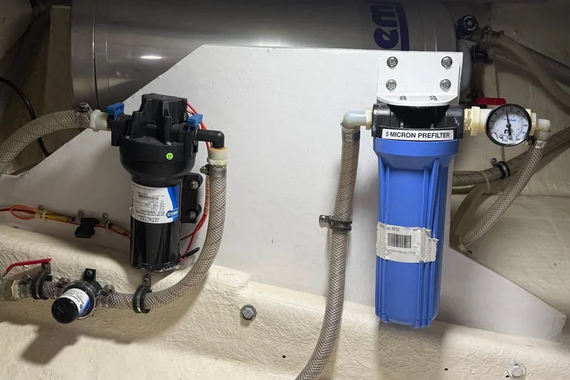 Slide: The Image of Water filtration system in a 1985 DeFever 40 Offshore Cruiser engine room. - 51