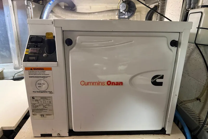 Slide: The Image of Cummins Onan generator in 1985 DeFever 40 Offshore Cruiser engine room. - 50