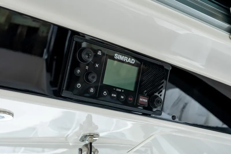 Slide: The Image of Simrad marine radio on 2024 Boston Whaler 405 Conquest boat. - 43