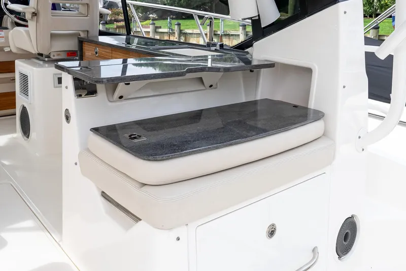 Slide: The Image of 2024 Boston Whaler 405 Conquest interior with sleek seating and modern design. - 28