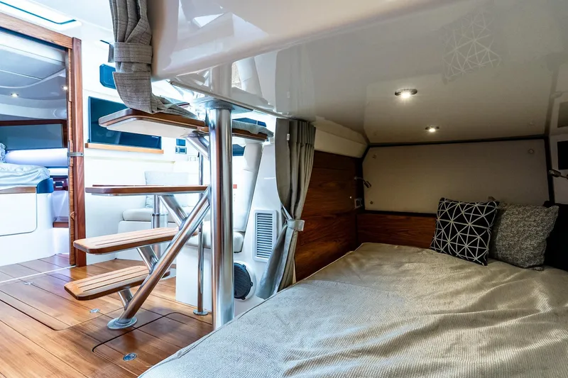 Slide: The Image of Luxurious interior of 2024 Boston Whaler 405 Conquest with cozy cabin and modern design. - 52