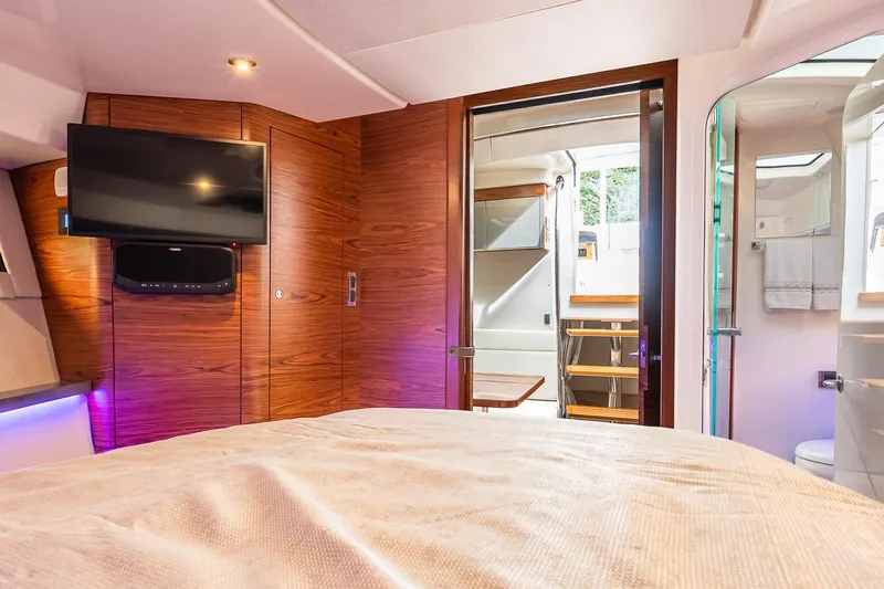 Slide: The Image of Luxurious interior of 2024 Boston Whaler 405 Conquest with wood accents and modern amenities. - 57