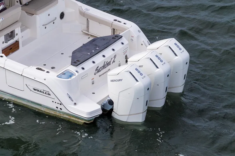 Slide: The Image of 2024 Boston Whaler 405 Conquest with triple Mercury 600 engines on water. - 9