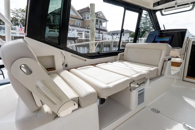 Slide: The Image of 2024 Boston Whaler 405 Conquest interior with luxurious seating and modern design. - 37